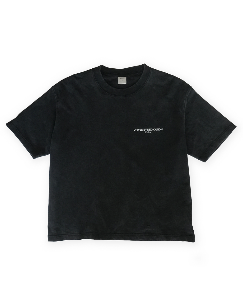 Zelos Tee Black — front flat lay with Driven by Dedication chest print
